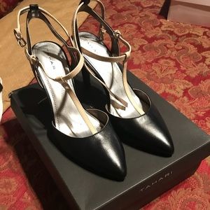 Black pointed toe pumps